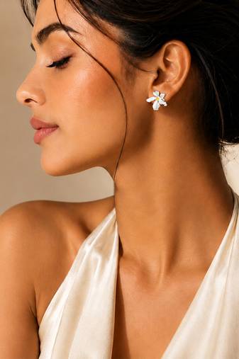 Silver metallic floral stud earrings