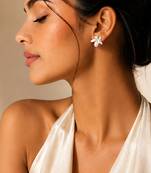 Silver metallic floral stud earrings