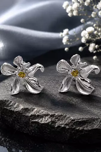 Silver metallic floral stud earrings