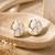 White stone metallic dome stud earrings