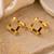Gold plated metallic square grid earrings