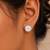 Gold plated white crystal stud earrings