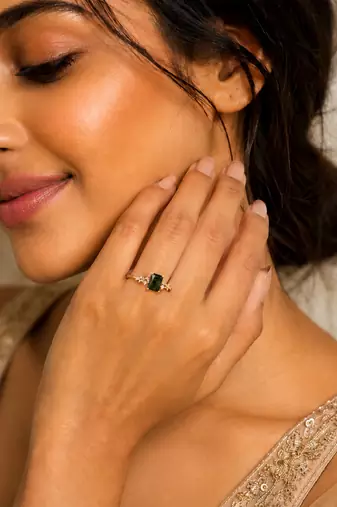 Gold plated green stone metallic ring