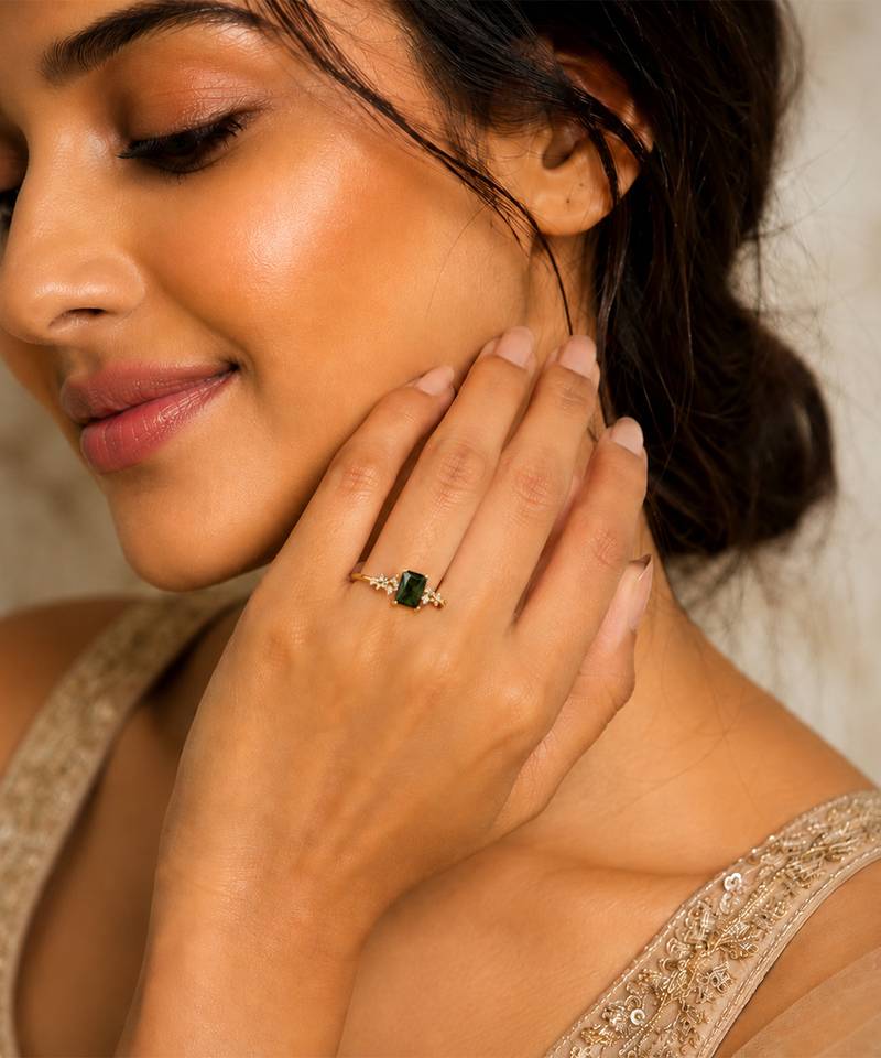 Gold plated green stone metallic ring
