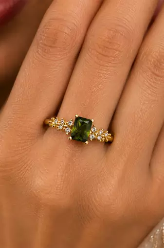 Gold plated green stone metallic ring