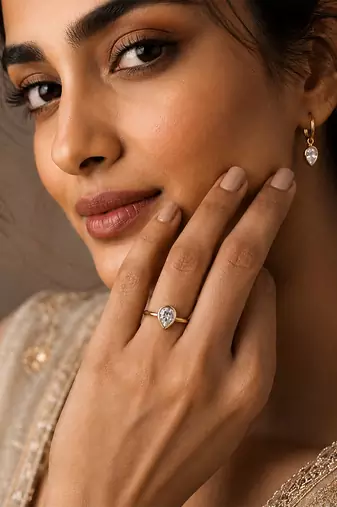 Gold plated pear shaped solitaire ring