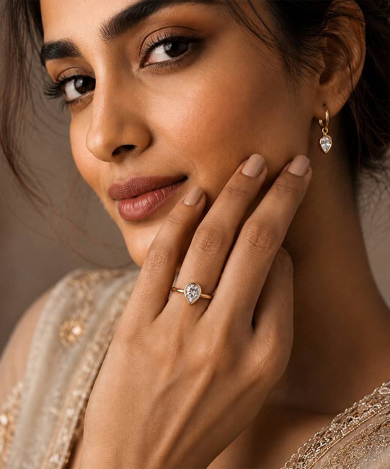 Gold plated pear shaped solitaire ring