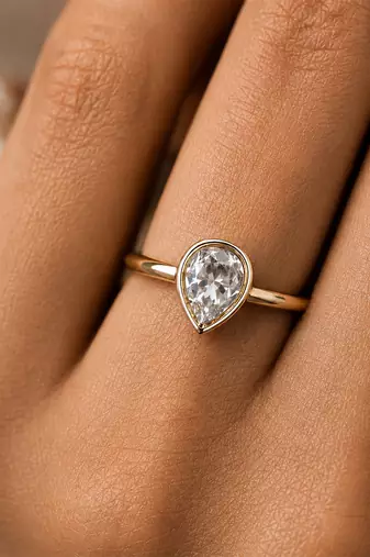 Gold plated pear shaped solitaire ring