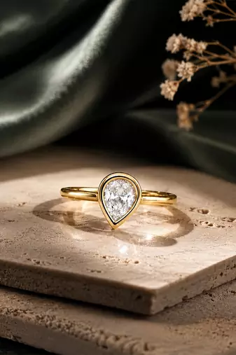 Gold plated pear shaped solitaire ring