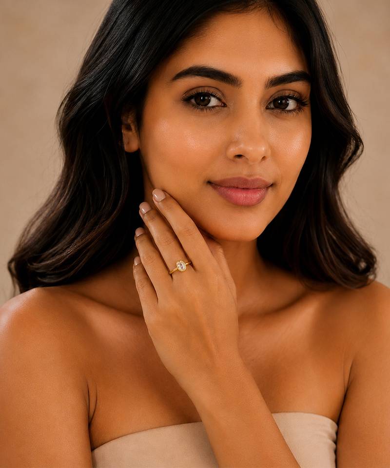 Gold plated oval stone metallic ring