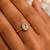 Gold plated oval stone metallic ring