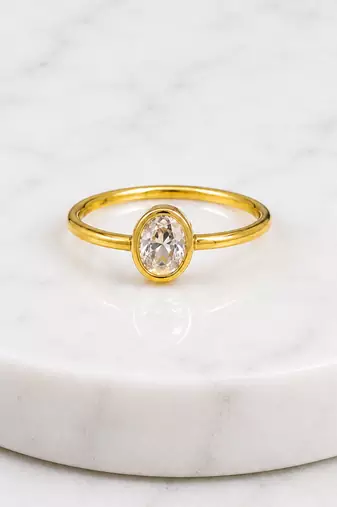 Gold plated oval stone metallic ring