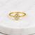 Gold plated oval stone metallic ring
