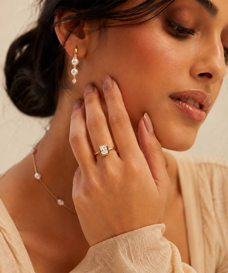 Gold plated emerald cut metallic ring