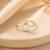 Gold plated emerald cut metallic ring