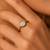 Gold plated metallic round solitaire ring