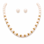 Pearl necklace set with gold-tone spacer rings, white oval freshwater pearls, round stud earrings included