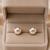 Pearl stud earrings, white freshwater pearl with gold-tone claw setting, classic elegant style