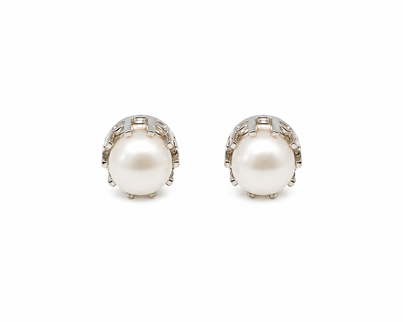 Pearl stud earrings, white freshwater pearl, silver-tone crown setting, classic elegant jewellery.