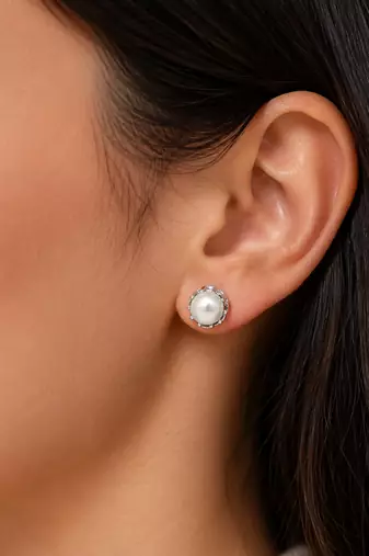 Pearl stud earrings, white freshwater pearl, silver-tone crown setting, classic elegant jewellery.