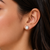 Pearl stud earrings, white freshwater pearl, silver-tone crown setting, classic elegant jewellery.