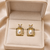 Freshwater baroque pearl stud earrings, gold-toned square frame with crystal zirconia, elegant jewellery
