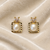 Freshwater baroque pearl stud earrings, gold-toned square frame with crystal zirconia, elegant jewellery