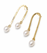 Gold-tone hammered arc drop earrings with freshwater pearl dangles, elegant stud style