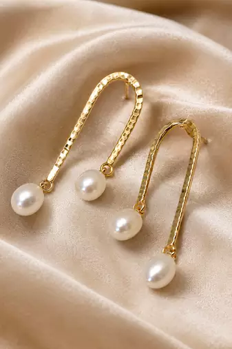 Gold-tone hammered arc drop earrings with freshwater pearl dangles, elegant stud style