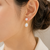 Double pearl drop earrings, white freshwater pearl stud with teardrop dangle, gold-tone setting