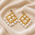 Gold-toned pearl drop earrings, diamond grid design with cz stud, dangling pearl chandelier style