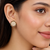 Round pearl cluster stud earrings with ruby, emerald and diamond accents, gold-toned, traditional indian style