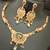 Green pink round cz round mango stones brass rajwadi jewellery set