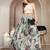 Green floral printed cotton flared maxi skirt for women