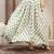 Green floral printed cotton flared maxi skirt for women