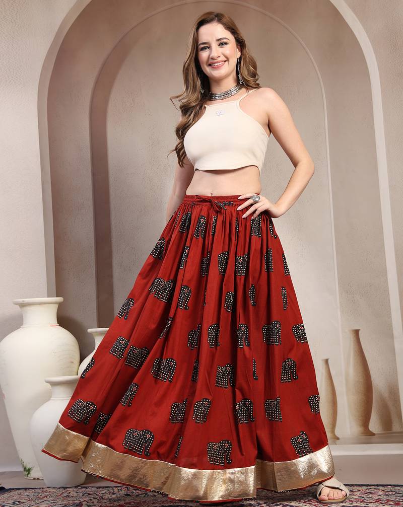 Orange graphic printed cotton flared maxi skirt for women