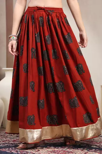 Orange graphic printed cotton flared maxi skirt for women