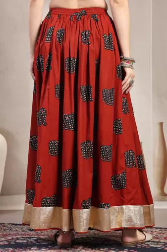 Orange graphic printed cotton flared maxi skirt for women