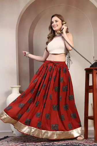 Orange graphic printed cotton flared maxi skirt for women
