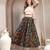 Teal floral printed cotton flared maxi skirt for women