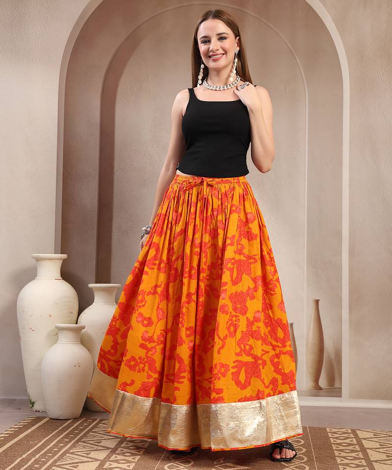 Orange floral printed cotton flared maxi skirt for women