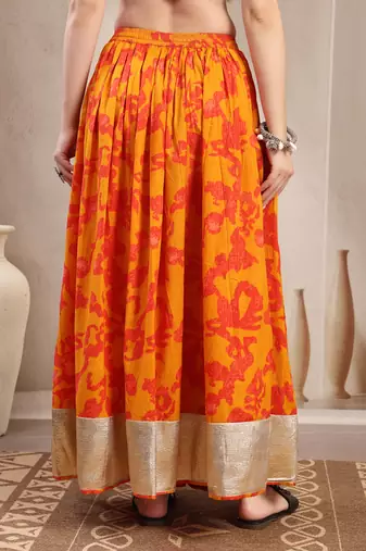 Orange floral printed cotton flared maxi skirt for women