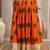 Orange graphic printed cotton flared maxi skirt for women