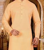 Beige cotton kurta with pattern work and fancy button