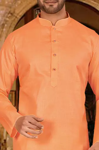 Orange cotton kurta with pattern work and fancy button