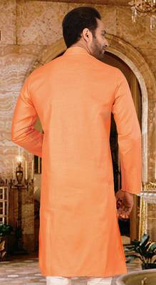 Orange cotton kurta with pattern work and fancy button 3