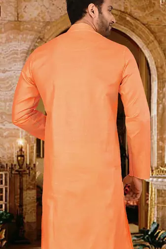 Orange cotton kurta with pattern work and fancy button