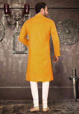 Yellow cotton  kurta with pattern work and fancy button churidar 3