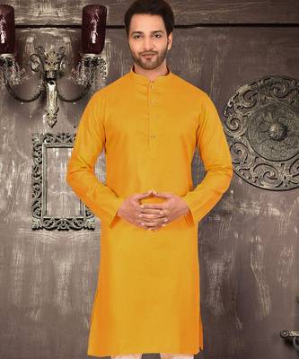 Yellow cotton  kurta with pattern work and fancy button churidar 4
