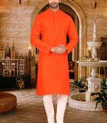 Dark orange cotton  kurta with pattern work and fancy button churidar